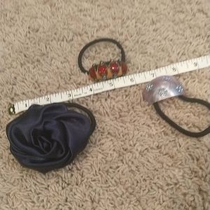 Bundle of 3 ponytail elastics.